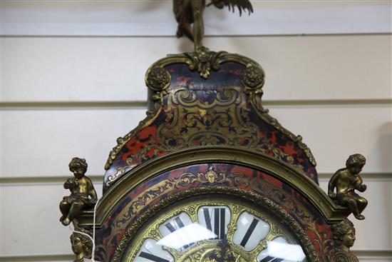 A 19th century French ormolu mounted red boulle wall clock, H.4ft 7in.